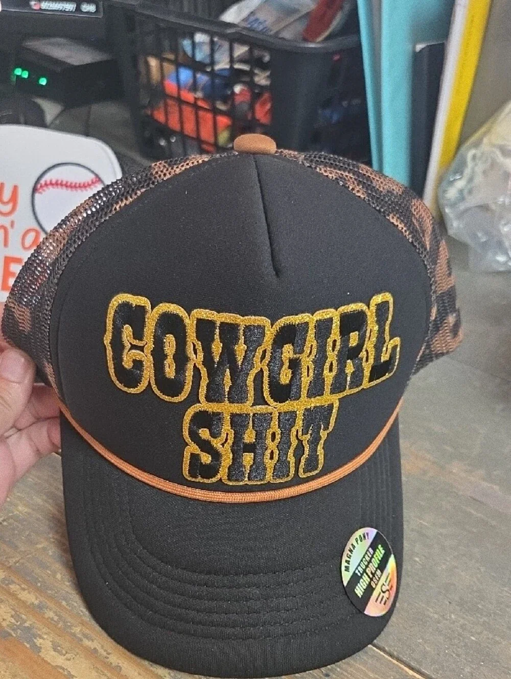 Black 'Cowgirl Shit' Trucker Hat with Gold Embroidered Lettering